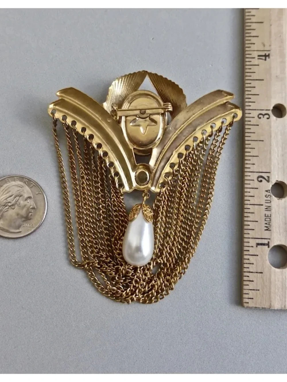 Large gold Tone Vintage Brooch w/Red Oval Stone, Faux Pearl Drop & chain Fringe.